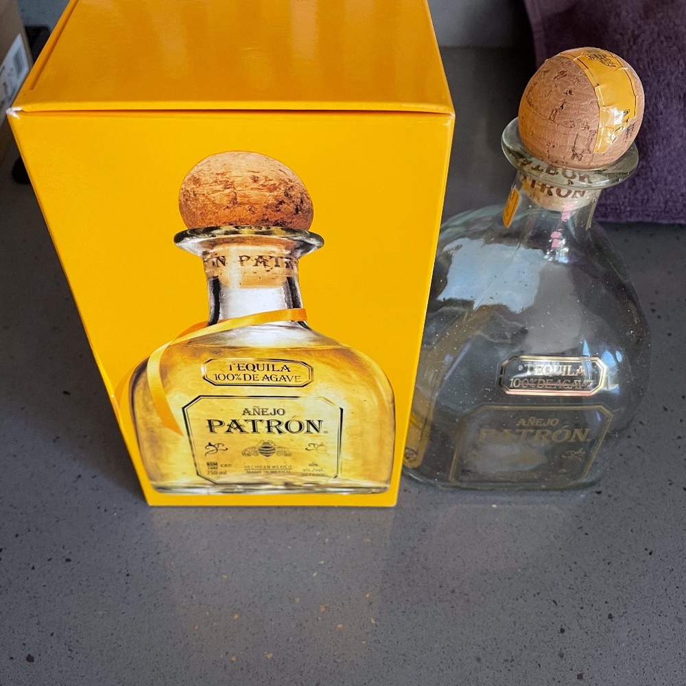 Empty Patron Anejo bottle and box